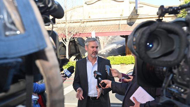 Prospect Mayor David O'Loughlin speaks to the media in front of the destroyed building Picture: Keryn Stevens