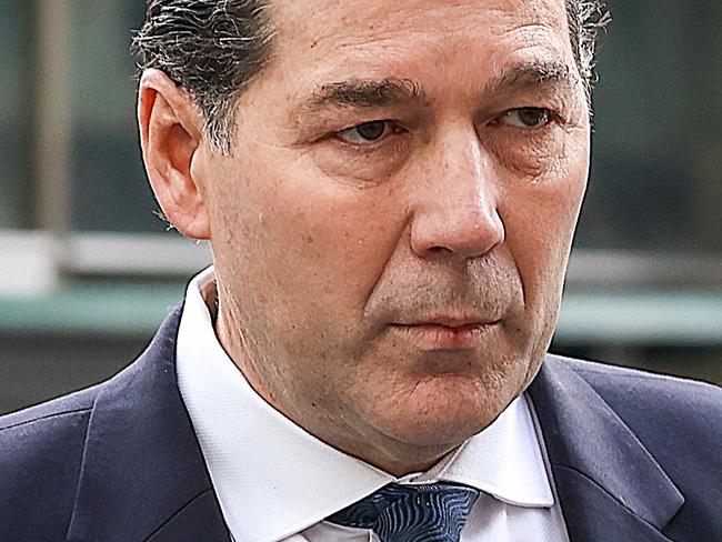 MELBOURNE, AUSTRALIA- NewsWire Photos 13 JULY 2021 : County Court. Chiropractor Malcolm Hooper leaves court after his sentence.A patient died at Hooper's Oxymed clinic in South Yarra after the man had a seizure in a hyperbaric chamber in 2016. Picture : NCA NewsWire / Ian Currie