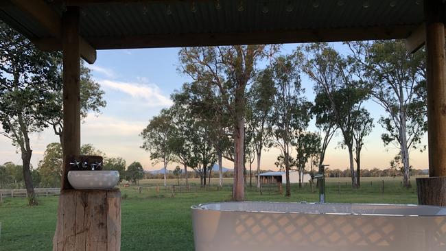 This alfresco spa, complete with fairy lights and a sink made from a eucalyptus stump, has the best view on Kiera Farm.