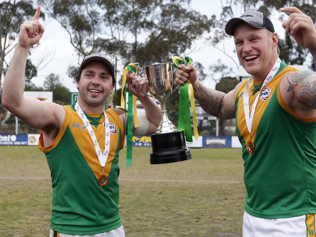 Chris O’Keefe and Ray Jensen with Spotswood’s 2011 premiership cup.