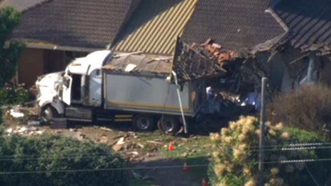 The truck veered off the Princes Hwy in Tower Hill and ploughed into a home. Picture: 7NEWS