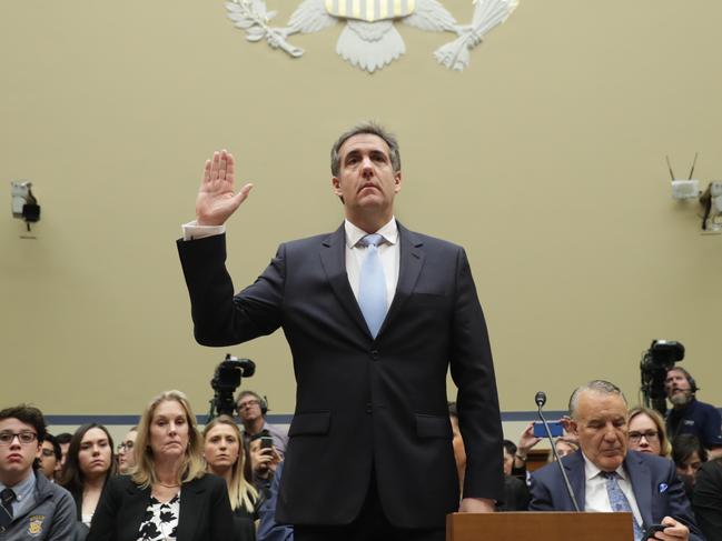 WASHINGTON, DC - FEBRUARY 27: Michael Cohen, former attorney and fixer for President Donald Trump is sworn in before testifying before the House Oversight Committee on Capitol Hill February 27, 2019 in Washington, DC. Last year Cohen was sentenced to three years in prison and ordered to pay a $50,000 fine for tax evasion, making false statements to a financial institution, unlawful excessive campaign contributions and lying to Congress as part of special counsel Robert Mueller's investigation into Russian meddling in the 2016 presidential elections. (Photo by Chip Somodevilla/Getty Images)