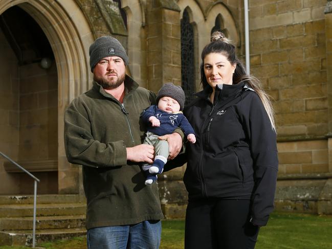 Grant Monks, whose family’s association with the St Michael and All Angels Church dates back beyond the 1930s, with son, Jacob and partner Katie Nichols. Picture: MATT THOMPSON