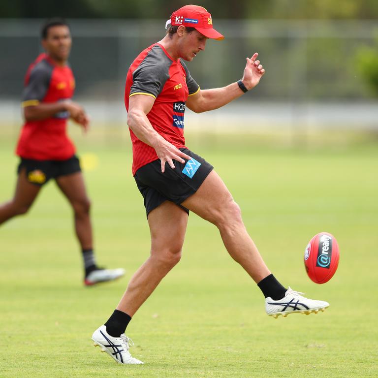 David Swallow kicks during a Gold Coast Suns AFL media and training session at Metricon Stadium on November 04, 2019 in Gold Coast, Australia. (Photo by Chris Hyde/Getty Images)