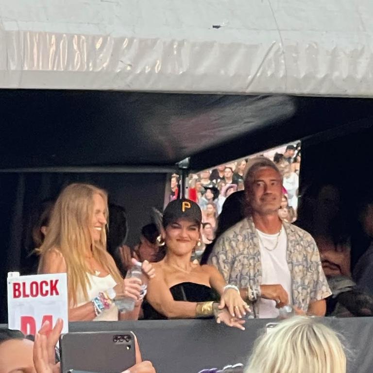 Toni (left) in the celeb tent on night one, alongside Rita Ora and Taika Waititi.