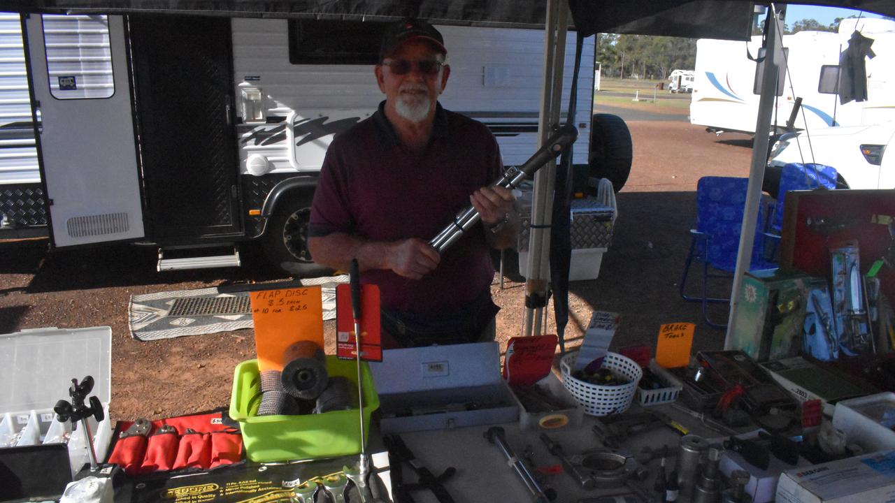 SWAP MEET: Colin Peak from Yandina shows off tools for sale at the Maryborough swap meet. Photo: Stuart Fast