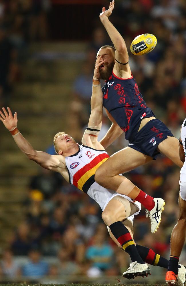 Max Gawn cleans up Reilly O'Brien at the opening bounce. Picture: Scott Barbour/Getty Images