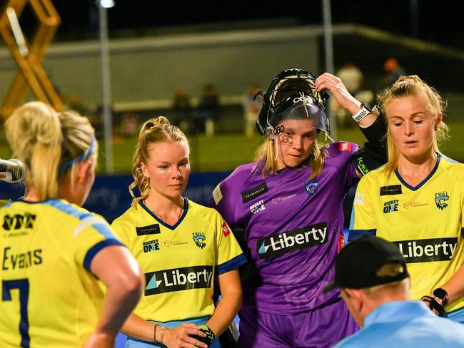 Emma Davidsmeyer (third from left) pictured with Canberra Chill teammates in a Hockey One game against Brisbane. Picture: Annette Andrews