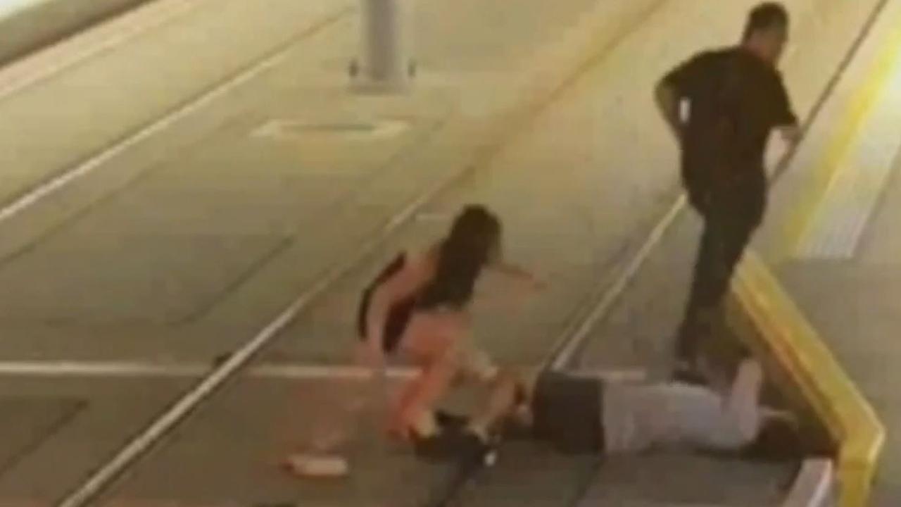 Gatt’s victim (grey shirt) was knocked out cold on the tracks.