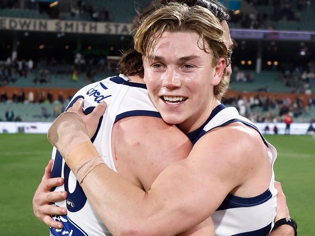 ADELAIDE, AUSTRALIA - SEPTEMBER 05: Jack Henry (left) and Tanner Bruhn of the Cats celebrate during the 2024 AFL Second Qualifying Final match between the Port Adelaide Power and the Geelong Cats at Adelaide Oval on September 05, 2024 in Adelaide, Australia. (Photo by Michael Willson/AFL Photos via Getty Images)