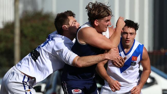 Ballarat: Jack Morrissey fires off a handball for Melton South. Picture: Hamish Blair