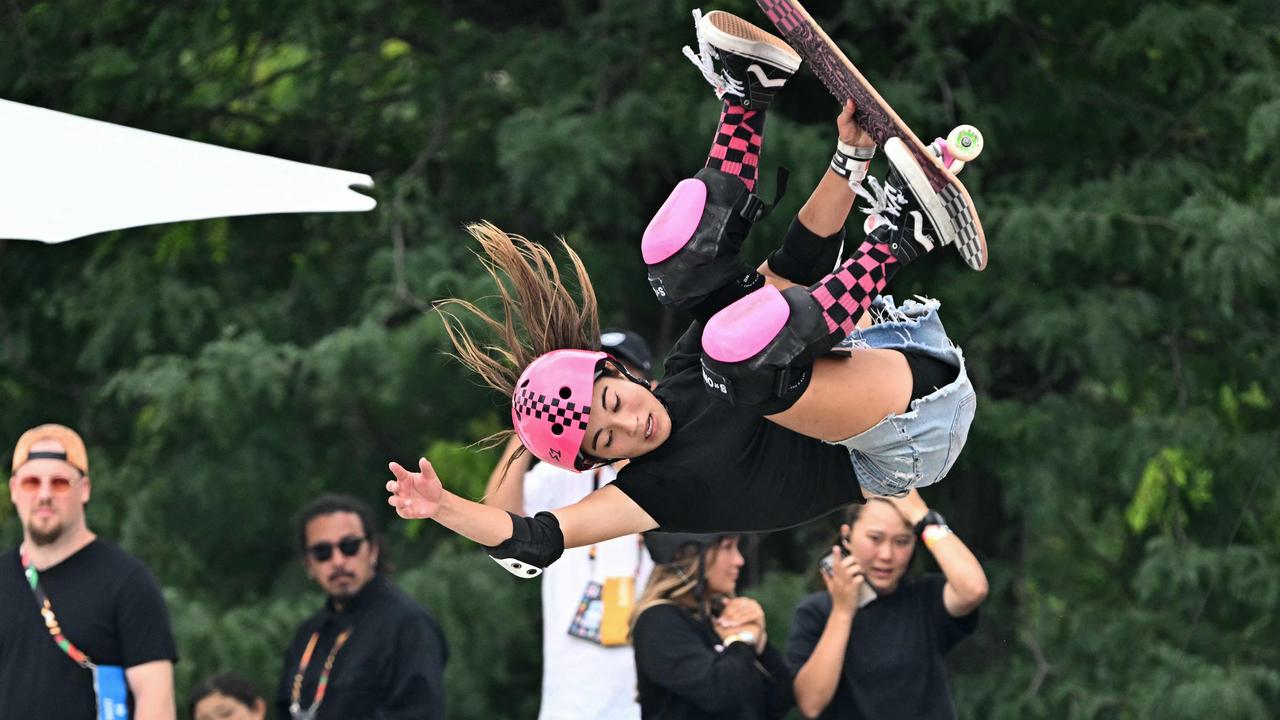 Australia's Arisa Trew falls as she competes during the Skateboarding Women's Park Final of the Olympic Qualifier Series 2024 in Budapest, Hungary on June 23, 2024. (Photo by Attila KISBENEDEK / AFP)