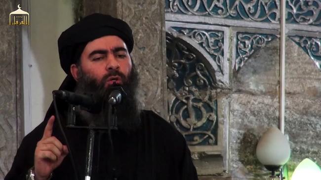 Abu Bakr al-Baghdadi at a mosque in Mosul, Iraq, in July 2014 – his only public appearance as Islamic State leader. Picture: AFP