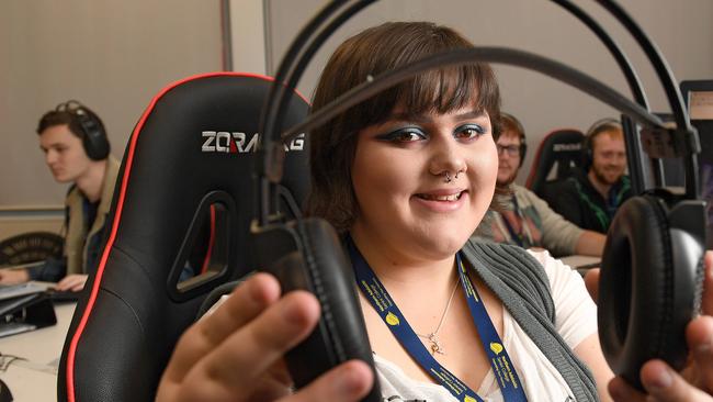 Northern Adelaide Senior College students Brandon Mann, 17, Clarissa Miller, 17, Bailey Runholm, 20, Robert Kohn, 18 and Aaron Cox, 19, will take part in the Crows' esport league for high shools. Picture: Naomi Jellicoe