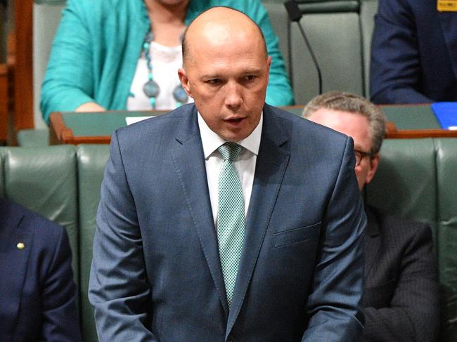 Minister for Home Affairs Peter Dutton during Question Time in the House of Representatives at Parliament House in Canberra, Thursday, September 13, 2018. (AAP Image/Mick Tsikas) NO ARCHIVING