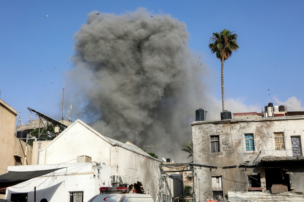 Gaza rescuers say Israeli fire kills 22 near aid site as truce talks falter