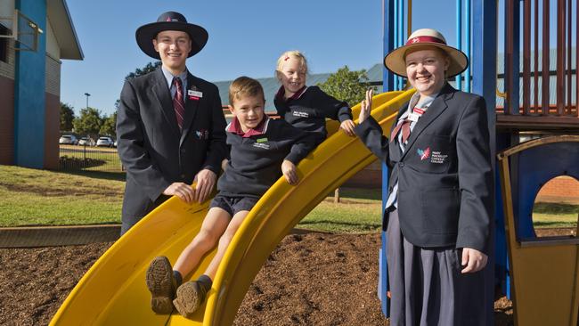 Mary MacKillop Catholic College captains and Connor McKerrow and Caitlin Lang with Prep students Sophia Smith and Dwyer Fox return to school, Monday, May 11, 2020. Picture: Kevin Farmer
