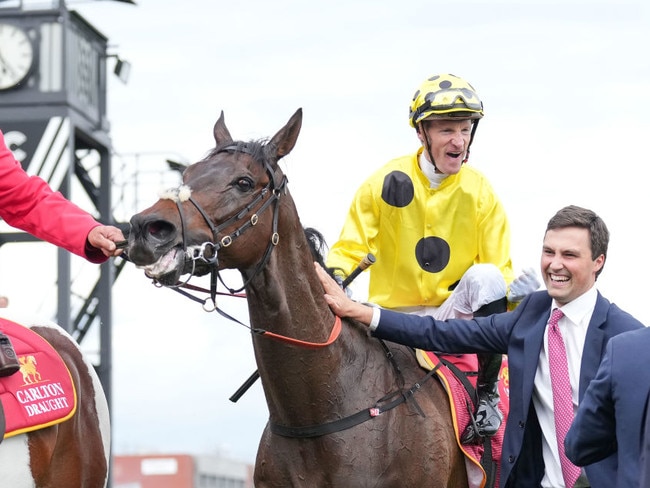 Without A Fight (IRE) ridden by Mark Zahra returns to the mounting yard after winning the Carlton Draught Caulfield Cup at Caulfield Racecourse on October 21, 2023 in Caulfield, Australia. (Photo by Scott Barbour/Racing Photos via Getty Images)