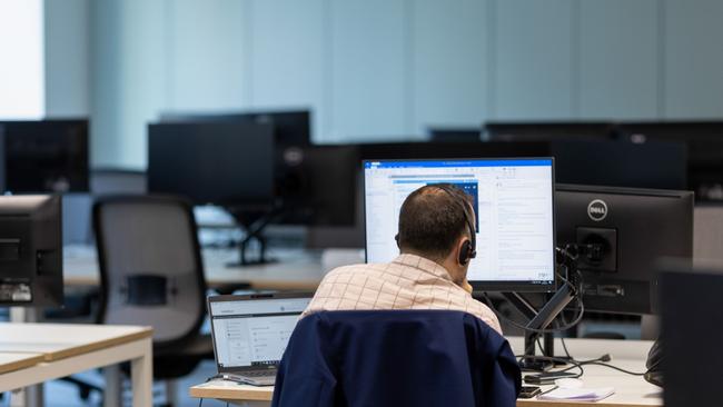 An office worker at a desk in the offices of Arcadis NV, after increasing their workplace capacity on July 19, in London, U.K. on Monday, Aug. 2, 2021. A survey this month showed that just 17% of London’s white-collar workers want a full-time return, and many said it’d take a pay rise to get them back five days a week. Photographer: Jason Alden/Bloomberg