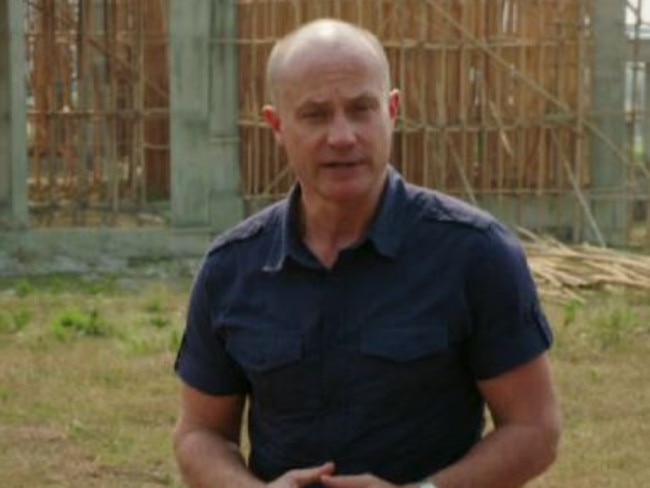 Overseas projects ... Four Corners reporter Geoff Thompson stands in front of the mosque in Indonesia. Picture: ABC