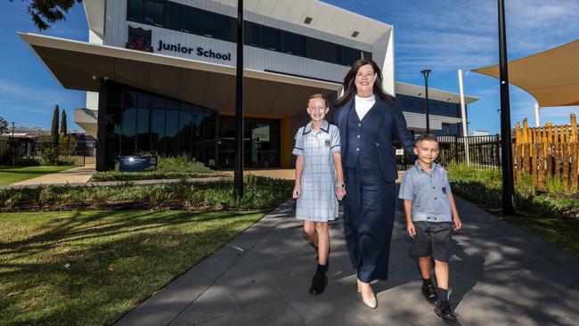 Woodcroft College principal Shannon Warren with students Jana Nel, 9, and Phoenix Cutajar, 6. Picture: Russell Millard Photography