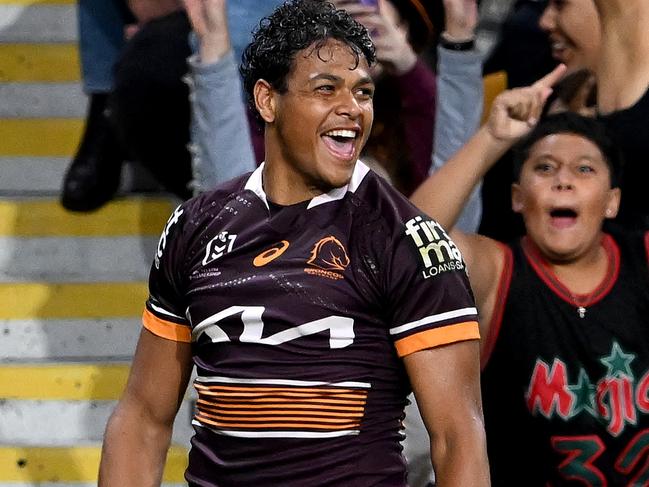 BRISBANE, AUSTRALIA - APRIL 22: Selwyn Cobbo of the Broncos celebrates scoring a try during the round seven NRL match between the Brisbane Broncos and the Canterbury Bulldogs at Suncorp Stadium, on April 22, 2022, in Brisbane, Australia. (Photo by Bradley Kanaris/Getty Images)