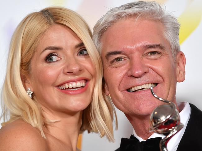 LONDON, ENGLAND - JANUARY 28: Holly Willoughby and Phillip Schofield pose with the award for Live Magazine Show for 'This Morning' in the winners room attends the National Television Awards 2020 at The O2 Arena on January 28, 2020 in London, England. (Photo by Gareth Cattermole/Getty Images)