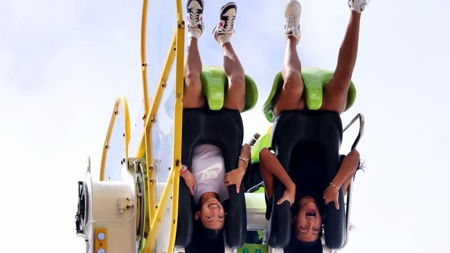 People on a ride in the carnival area at the Royal Easter Show on Good Friday, Sydney Olympic Park. Picture: NCA NewsWire / Damian Shaw