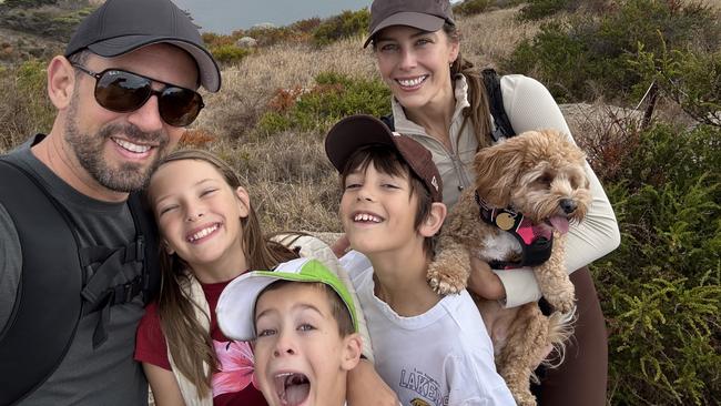 Van Ouwens is thriving at eight after undergoing proton therapy treatment in the US when he was six. He is pictured here during the school holidays with loving mum Paula, dad Alex, Maya, 12, and Finn 7. Picture: Supplied
