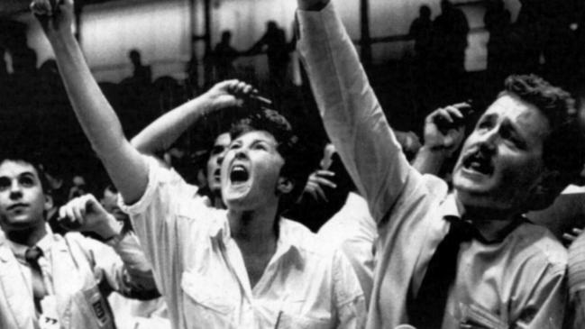 Dealers on the trading floor of the Sydney Stock Exchange yelling as they try to sell shares at the close of trading during the 1987 stockmarket crash.