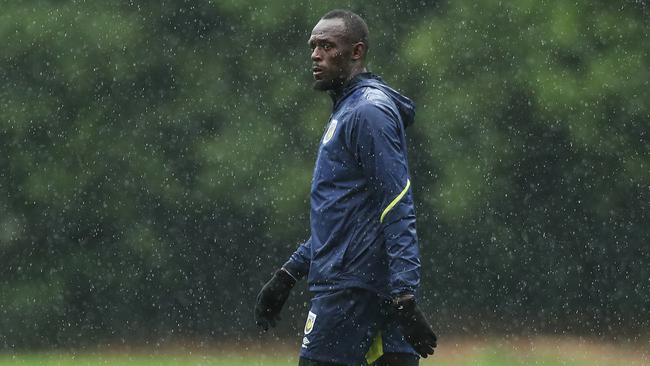 Usain Bolt at training with the Central Coast Mariners. Picture: Brett Costello
