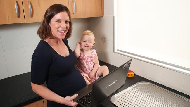 Working mum Amy Blacker with her daughter, Harriet.