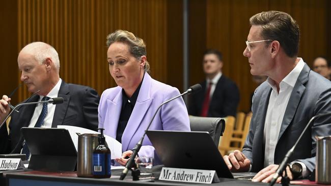 Qamtas company secretary Andrew Finch, with CEO Vanessa Hudson and chairman Richard Goyder at an inquiry into Australia’s bilateral airservices arrangements. Picture: NCA NewsWire / Martin Ollman