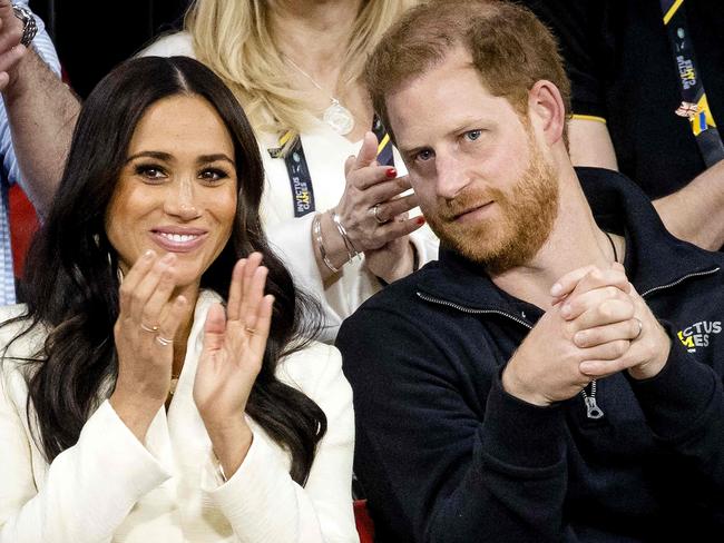 The Duke and Duchess of Sussex, Prince Harry and his wife Meghan Markle visit the sitting volleyball section of the fifth edition of the Invictus Games in The Hague on April 17, 2022. - The Invictus Games is an international sporting event for servicemen and veterans who have been psychologically or physically injured in their military service. (Photo by Sem van der Wal / ANP / AFP) / Netherlands OUT