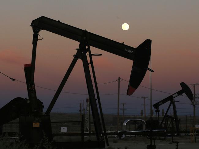 Oil derricks busy pumping in McKittrick, California. Picture: AP Photo/Gary Kazanjian