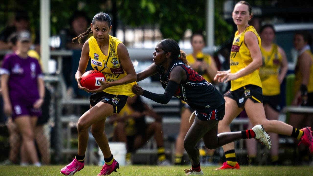 Nightcliff Tigers' Lekaiya Rabbitt (with the ball) on the run against Tiwi during Round 5 of the 2024-25 NTFL season. Picture: Patch Clapp / AFLNT Media.