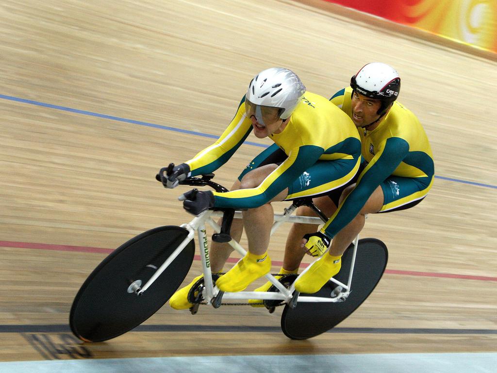 Australian Kieran Modra and his pilot Tyson Lawrence compete at the Men's gold medal 4000m Individual Pursuit at the Beijing Paralympic Games in Beijing in 2008 They won gold and broke the world record at 4 minutes 18.961. Picture: AP Photo/Andy Wong