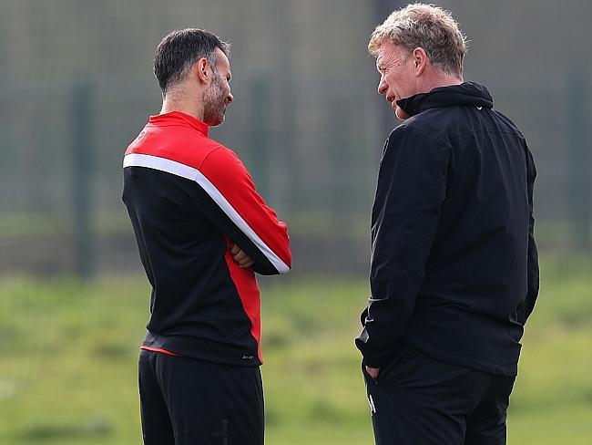 Moyes chats to Ryan Giggs, who has played sparingly under him amid reports they don’t get along.