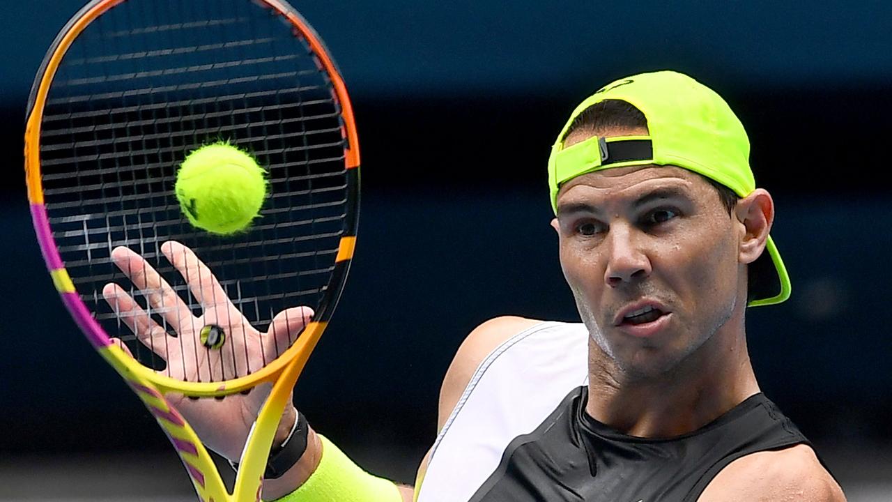 Spain's Rafael Nadal hits a return during a practice session ahead of the Australian Open tennis tournament in Melbourne on January 13, 2023. (Photo by PAUL CROCK / AFP) / – IMAGE RESTRICTED TO EDITORIAL USE – STRICTLY NO COMMERCIAL USE-