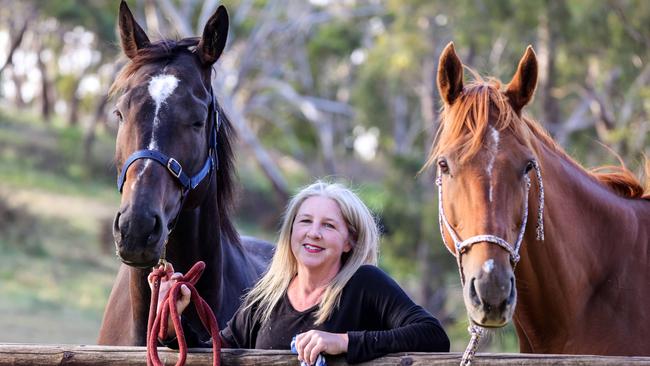 Jodie Hall with Chestnut and Rocco at her Meadows property. Pic: Russell Millard