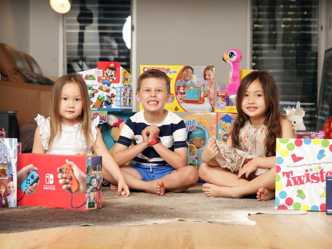 Evelina Sidey (3), Harrison Hafford (5) and Sienna Sidey (5) at their home in Balmain ahead of the Black Friday Toy Sales Day.Picture: Christian Gilles