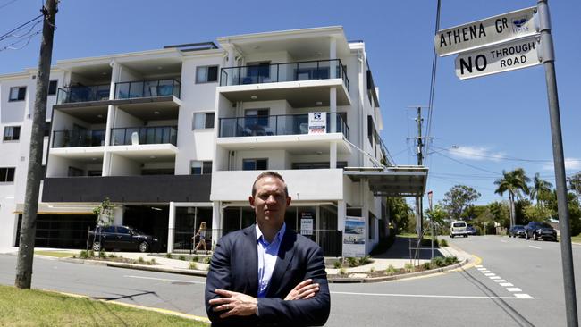 Housing and Public works Minister Mick de Brenni outside the Springwood units which triggered the inquiry into the failed Cullen Group. 