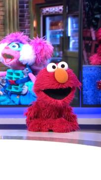 Elmo surprises young Aussie superfan