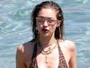 Sisters Bella Hadid and Gigi Hadid pictured with friends spending time on the Beach while on Holiday in Mykonos.