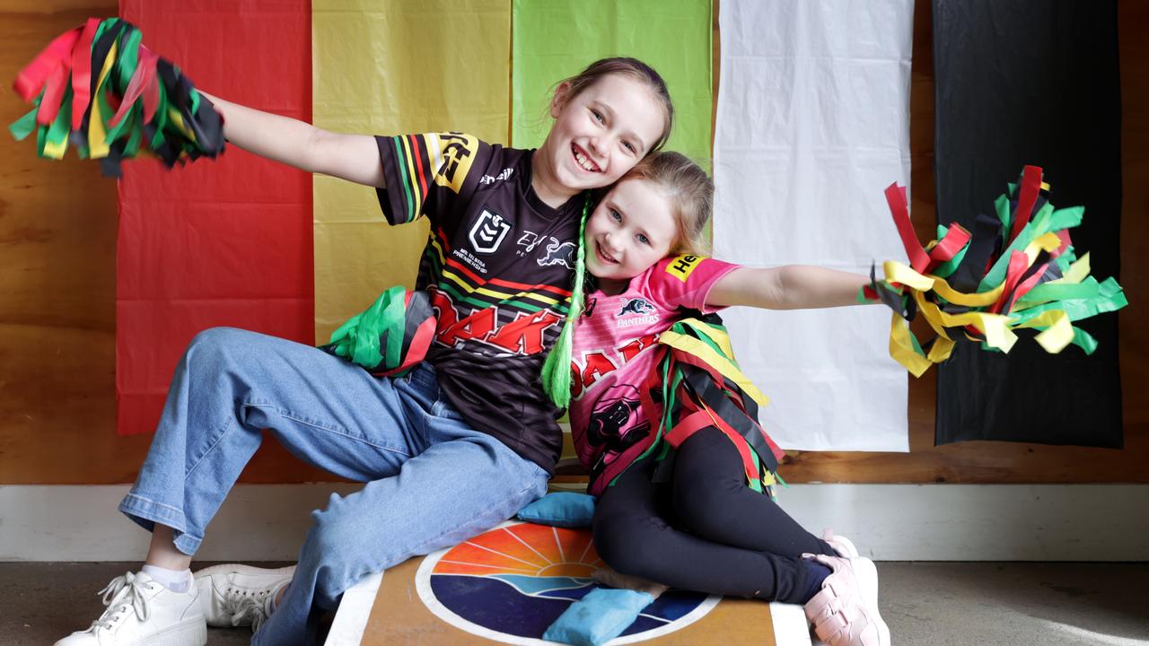 Penrith Panthers fans Sophia (7) and Olivia Davey (10) are excited their team made it to Sundays NRL grand final against the Melbourne Storm. Picture: Jane Dempster