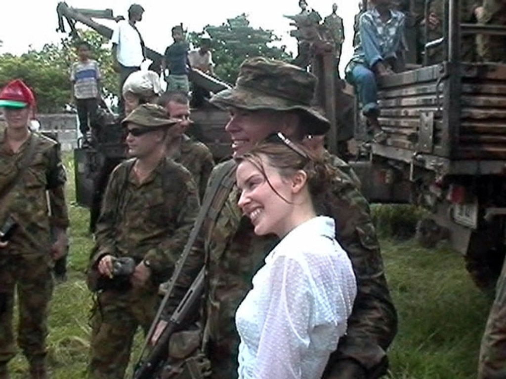 Kylie Minogue with Australian INTERFET peacekeeping force soldiers during the December 21, 1999 Dili Tour of Duty Christmas concert for troops in East Timor. Picture: Supplied