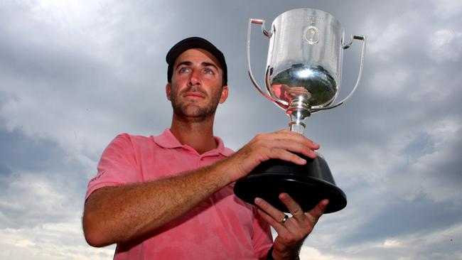 Geoff Ogilvy holds aloft the Kirkwood Cup after winning it in 2008.