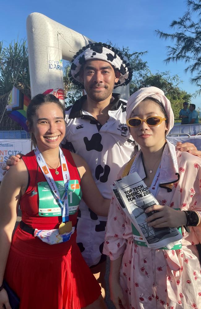 (L-R) Kristina Mu, Ray Nguyen and Nizza Doring dressed up for the NT City2Surf on Sunday.