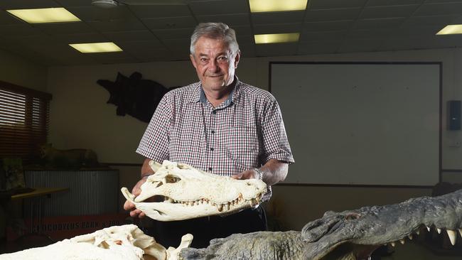 Professor Grahame Webb with the skull of a 5.5m monster croc at Crocodylus Park.