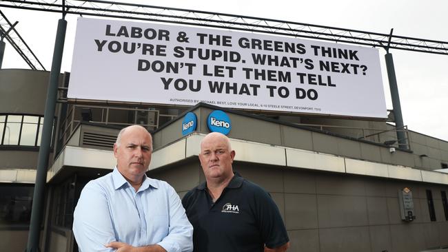 Chairman of Love Your Local Michael Best with THA chief, Steve Old outside the election billboard at the Brooker Inn. Picture: LUKE BOWDEN